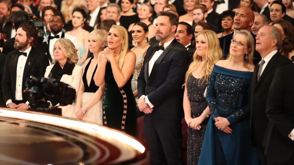 Michelle Williams, Busy Phillipps and Ben Affleck in shock after Best Picture snafu at the 2017 Academy Awards (Credit: Getty Images)